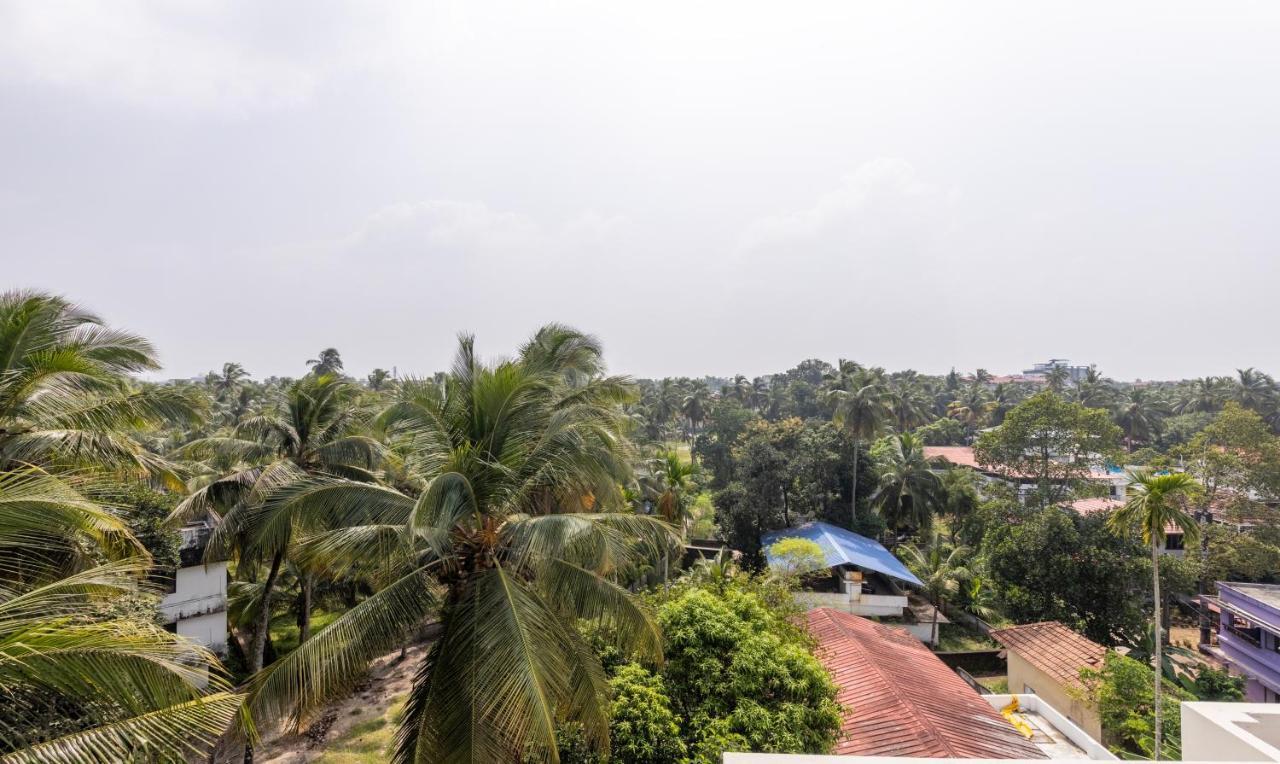 Готель Treebo Sreepathi Prayag,Guruvayur Temple Екстер'єр фото